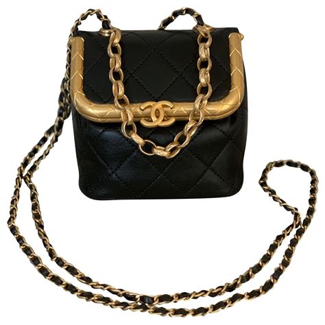 chanel small black plastic lock